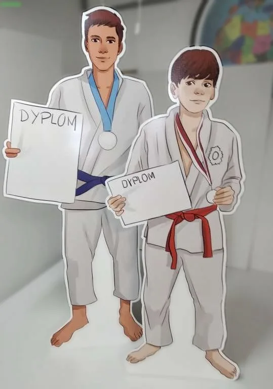 Postacie z dyplomami